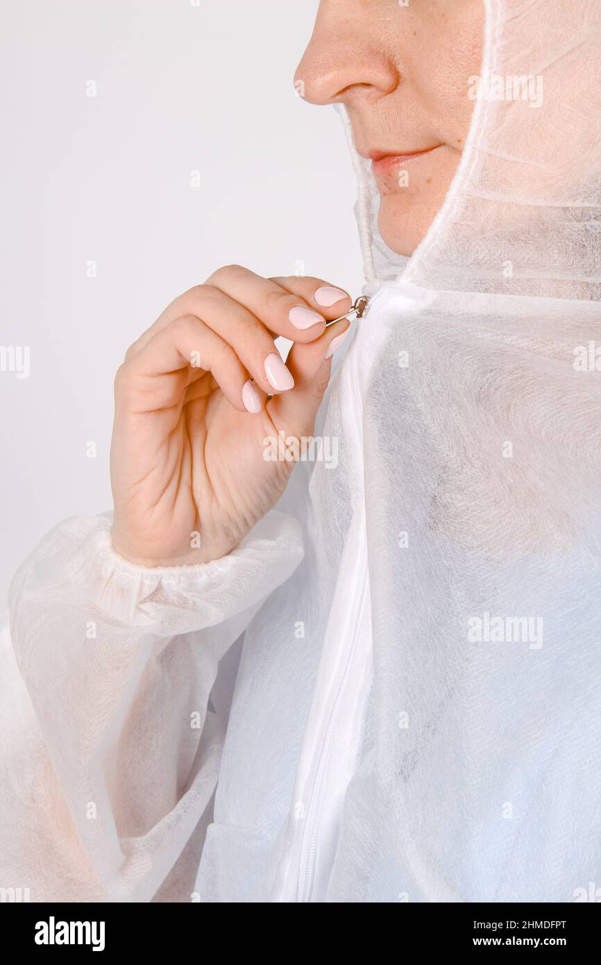 Female doctor wearing personal protective equipment in hospital