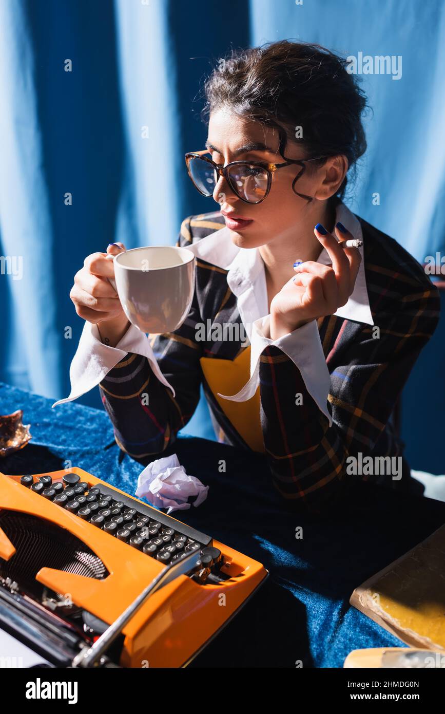 smoking cigarettes and drinking coffee blues Young woman drinking coffee smoking hi-res stock photography and images