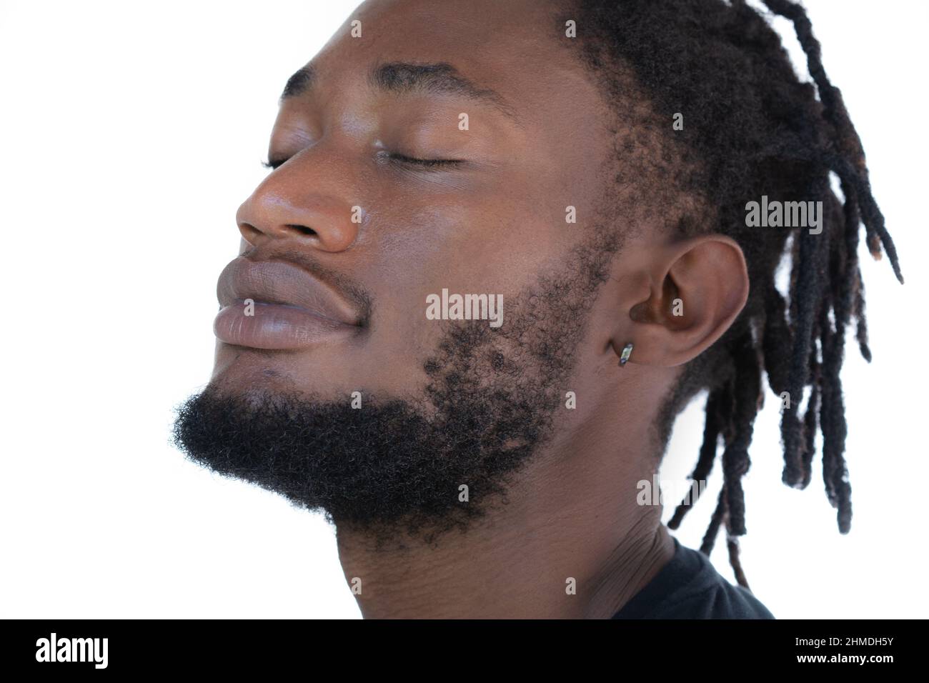 A portrait of a happy young man against a white background Stock Photo ...
