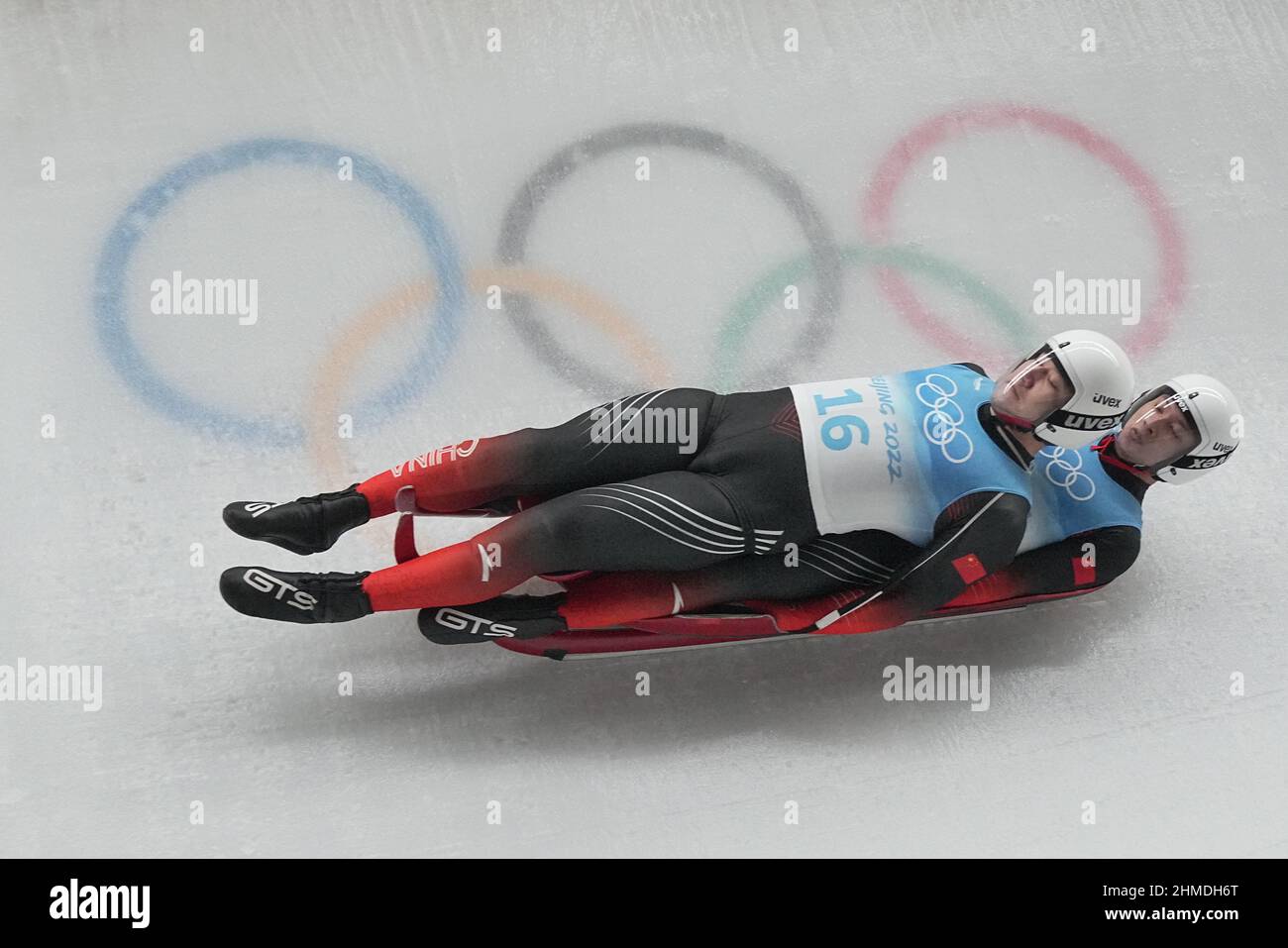 Peking, China. 09th Feb, 2022. Luge: Olympic Games, Doubles, Men, 2nd heat, Yanqing National Sliding Centre. Yebo Huang and Junyue Peng from China in action. Credit: Michael Kappeler/dpa/Alamy Live News Stock Photo