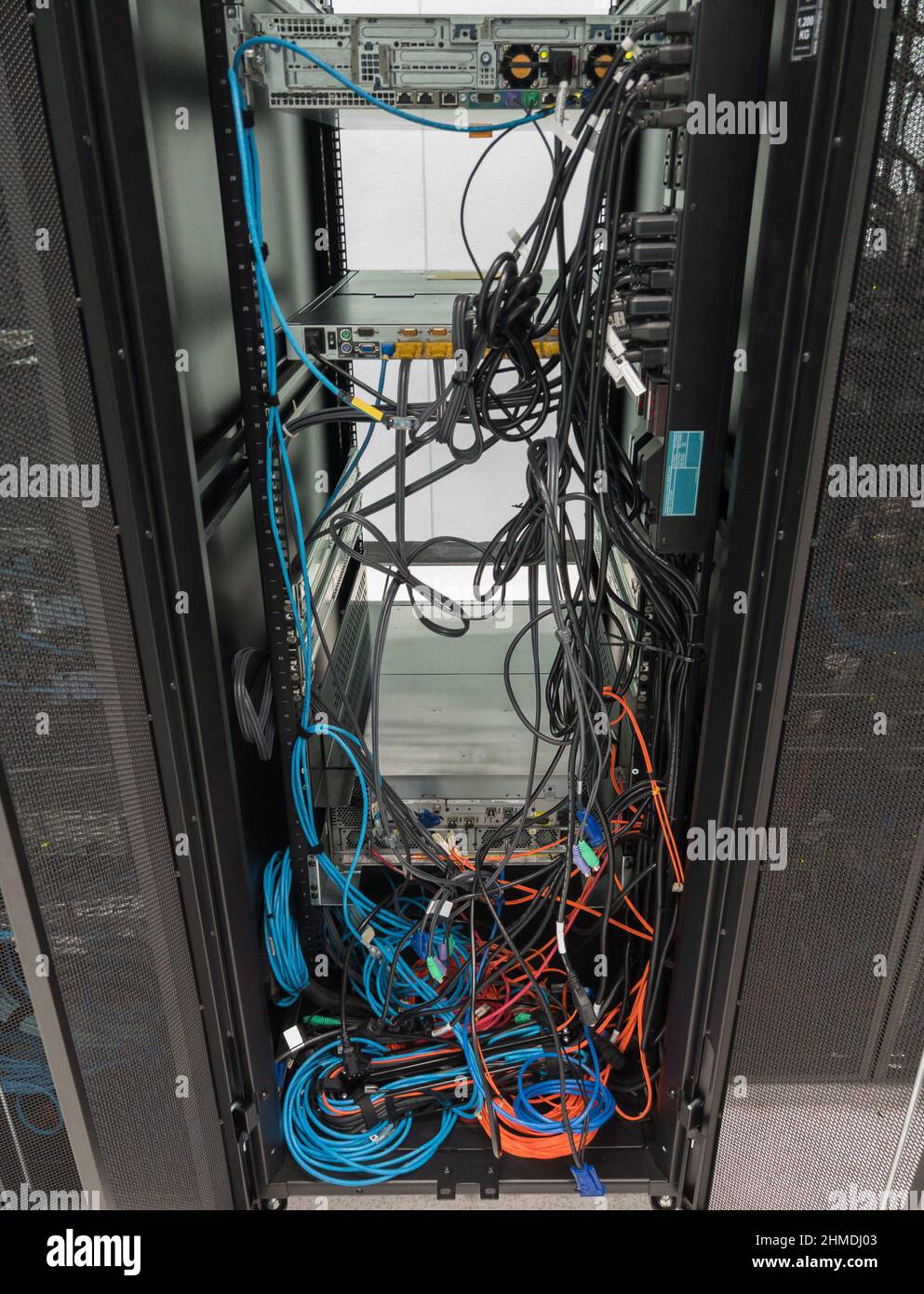 The backside of the server rack after removing the old storage to ...