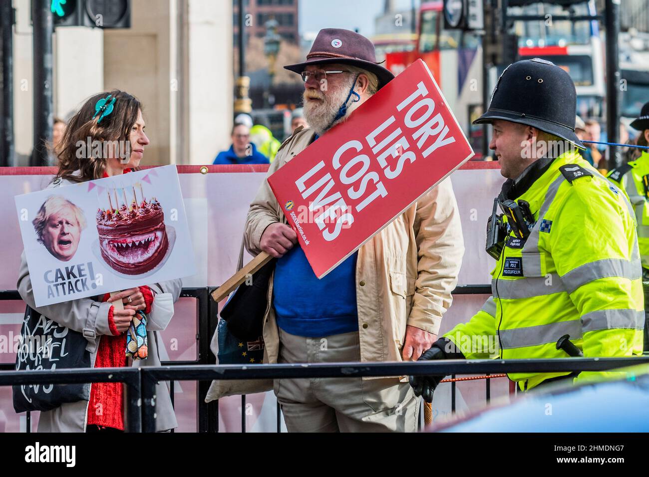 London, UK. 9th Feb, 2022. A police patrol passes by - SODEM (Pro EU) protest, led by Steve Bray, now accuse the Prime minister and his party of being 'corrupt' and 'liars' - Protesters in Westminster on the day of PMQ's. Boris Johnsons returns to Prime Minister's Questions (PMQ's) as his troubled times continue. Credit: Guy Bell/Alamy Live News Stock Photo