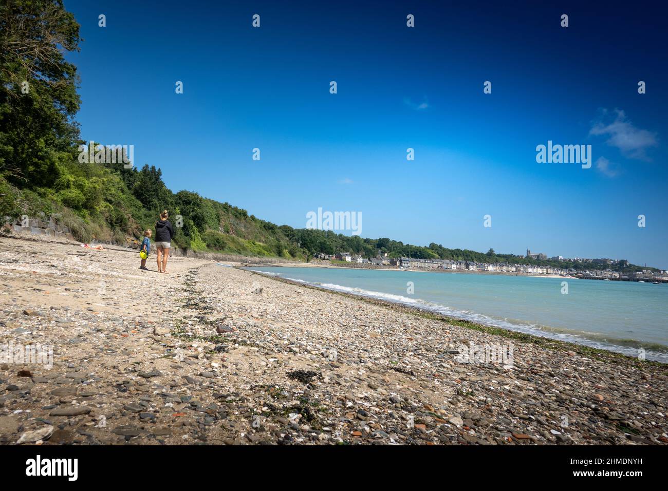 Mother with son walking on beach, Brittany, France Stock Photo