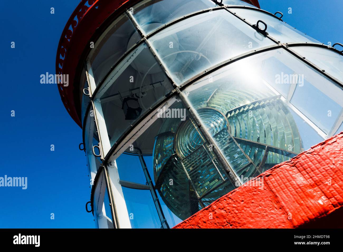 Low angle view of lighthouse lens against sky, Brittany, France Stock Photo