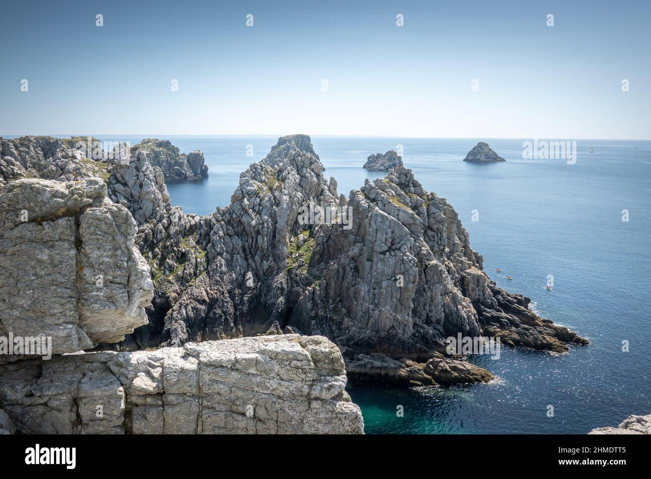 Scenic view of rocky cliff on sea, Brittany, France Stock Photo