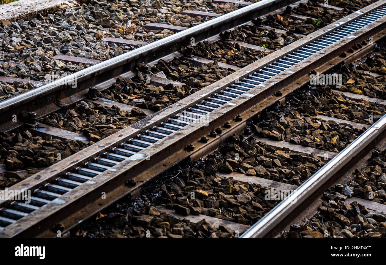 Cog railway tracks made from steel, on a gravel bed Stock Photo