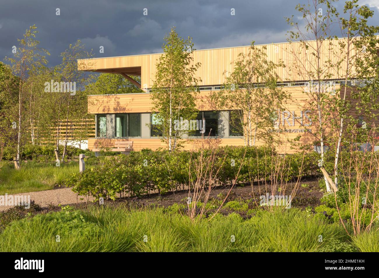 North west end of building with planting. Royal Horticultural Society Visitor Centre, Worsley, Salford, United Kingdom. Architect: Hodder & Partners, Stock Photo
