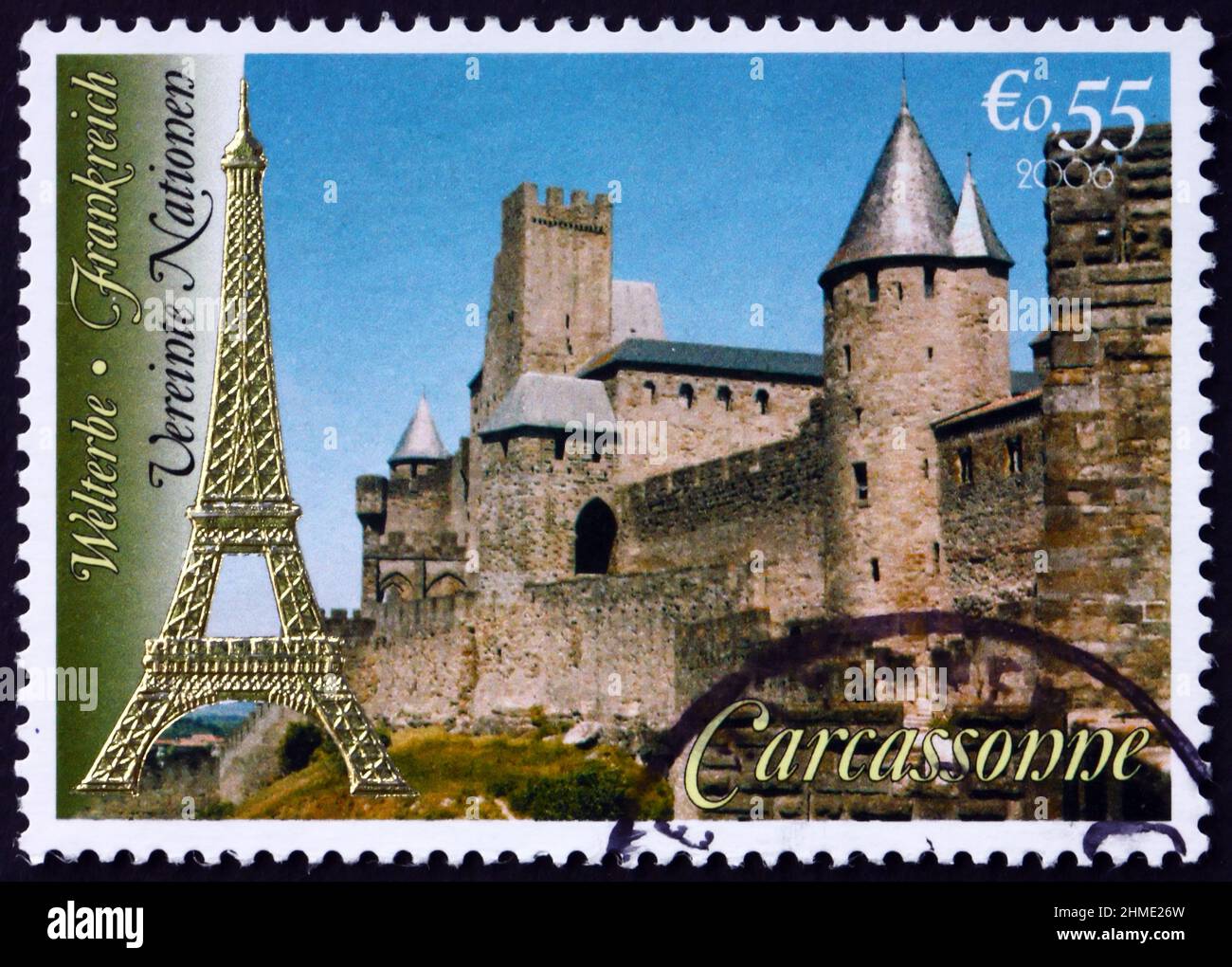 UNITED NATIONS - CIRCA 2006: a stamp printed in the United Nations, offices in Vienna shows Eiffel Tower and Carcassonne, World Heritage Site, circa 2 Stock Photo