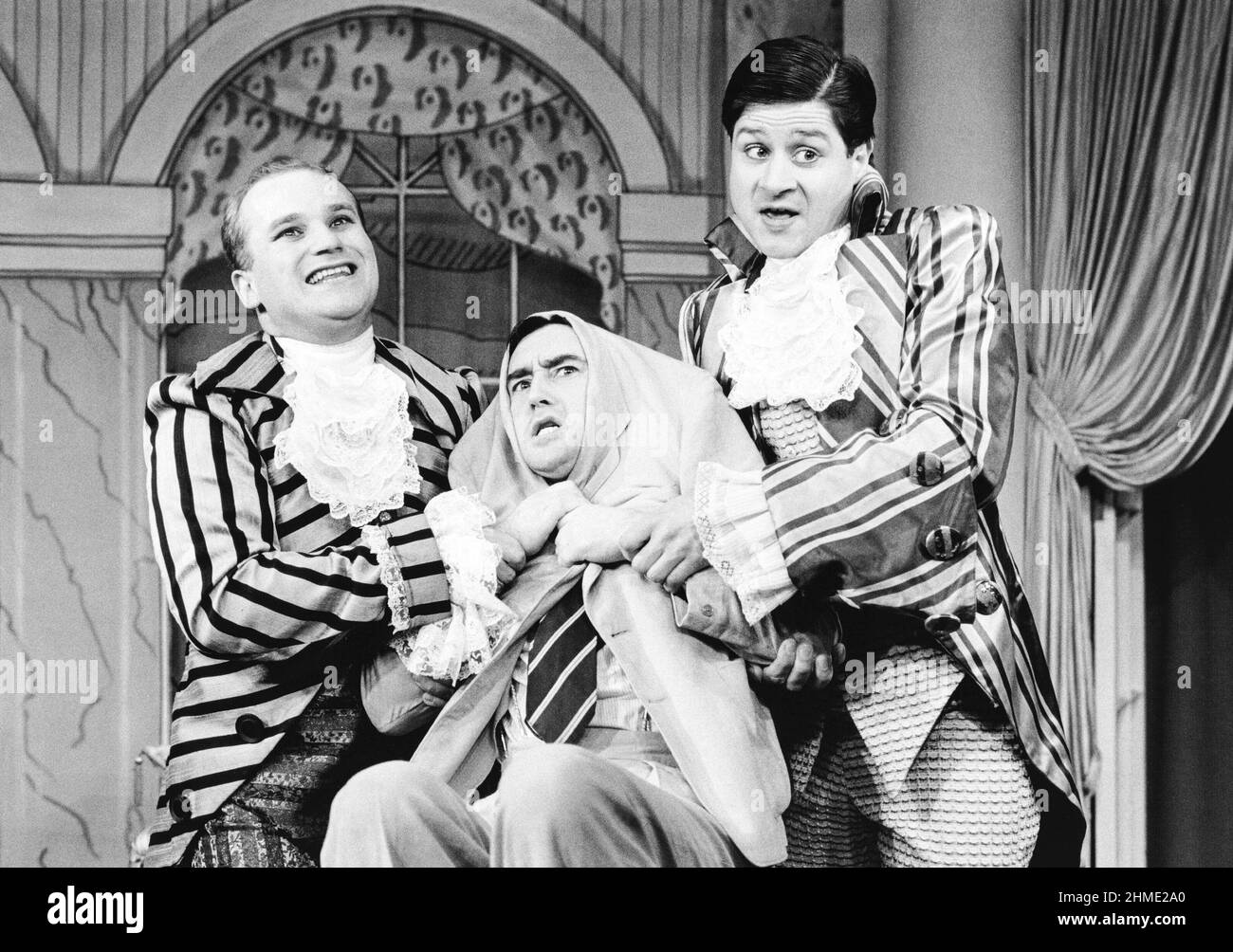 l-r: Graham Hoadly (Lumley), Denis Lawson (Jim), Philip Bird (Guy) in MR CINDERS by Clifford Grey & Greatrex Newman at the King’s Head Theatre Club, London N1  05/01/1983  additional lyrics by Leo Robin  music by Vivian Ellis & Richard Myers  set design: Norman Coates  costumes: Marty Flood  choreographer: Kenn Oldfield  director: Tony Craven Stock Photo