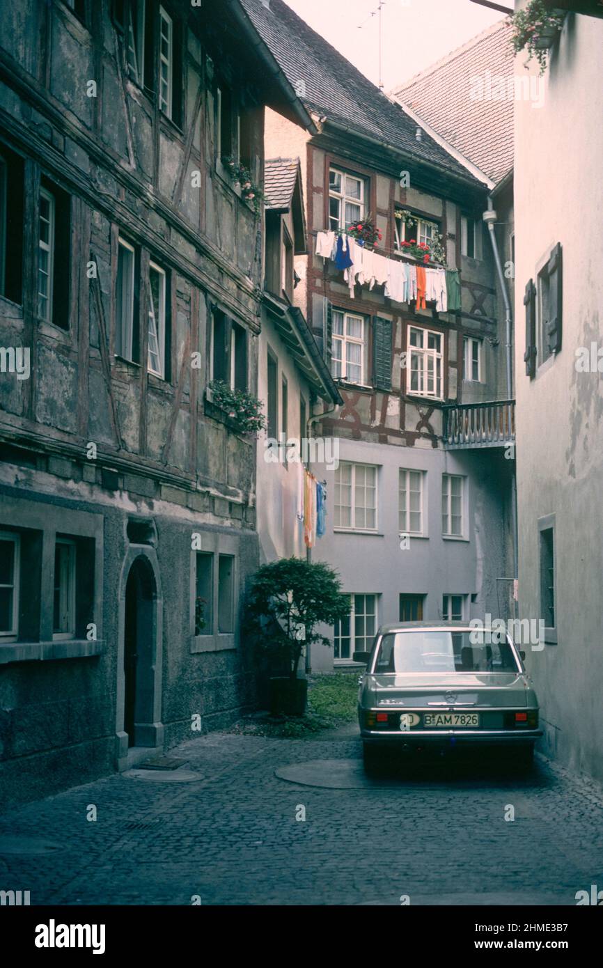 Mercedes 230.4 parked in narrow street in 1981, Meersburg, Baden-Württemberg, Germany Stock Photo