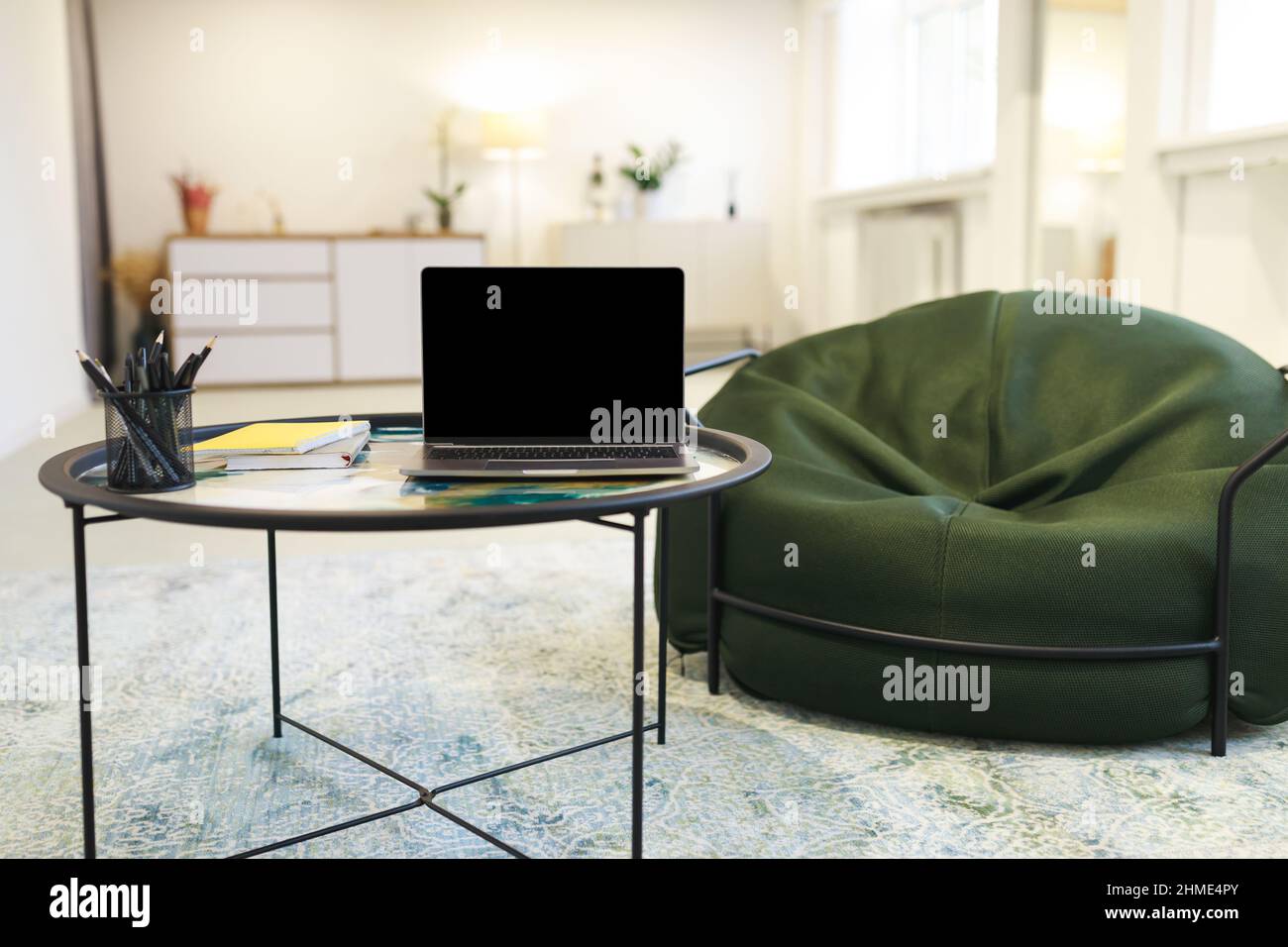 Modern Laptop With Black Empty Screen On Table, Mockup Stock Photo