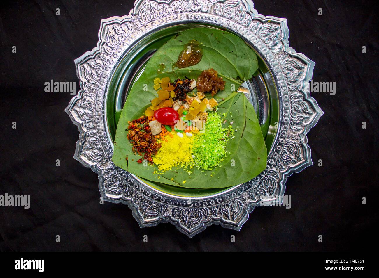 Cold indian paan masala on betel leaf top view Stock Photo