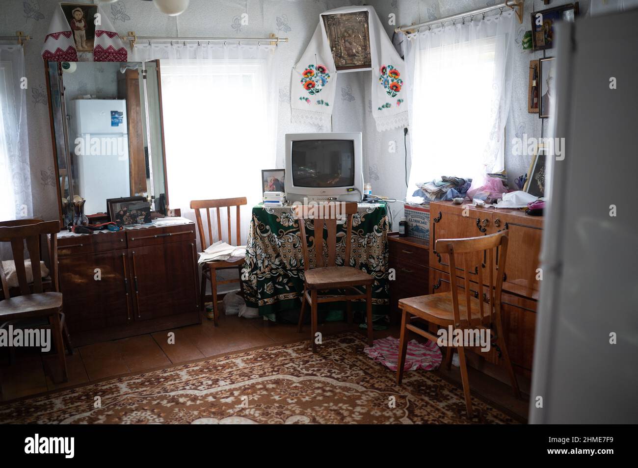 Inside the home of Baba Gania, one of the most famous Chernobyl resettlers, in Kupovate, Ukraine near the Chernobyl Nuclear Power Plant. Stock Photo