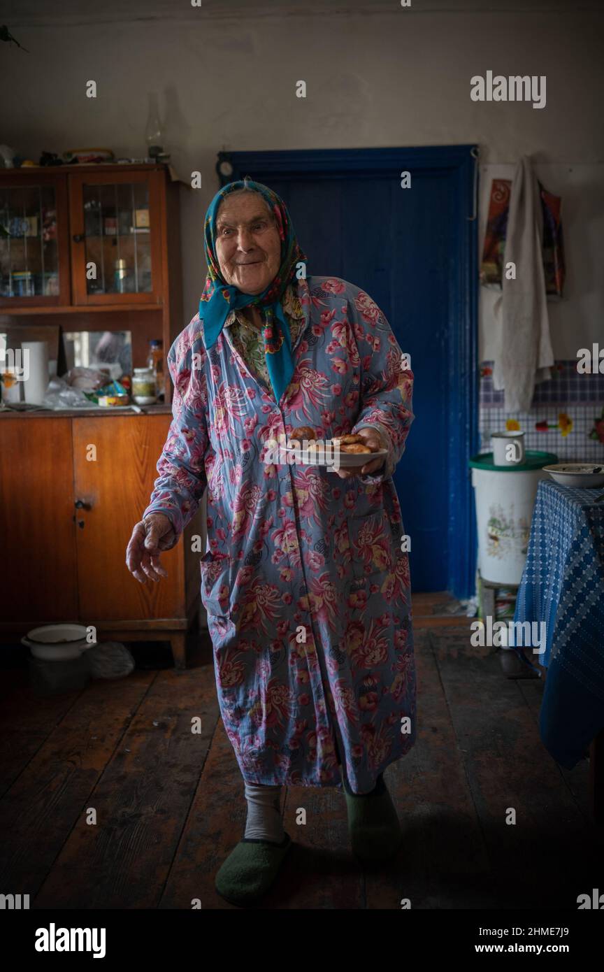 Baba Gania, a well known settler, has lived in the exclusion zone near the Chernobyl Nuclear Power Plant for many years. Stock Photo
