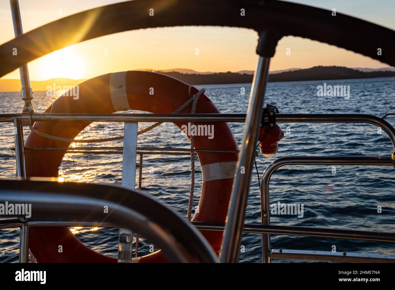 Sunset view from yacht. Sailing in Whitsundays Australia. Whitsunday Islands, Queensland. Stock Photo