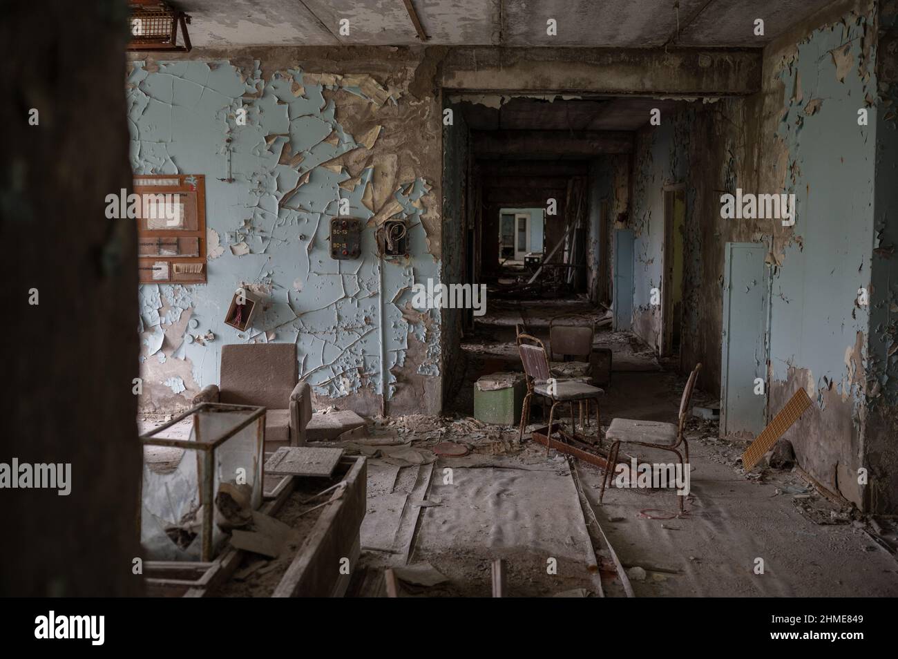 A large assortment of medicine, furniture and medical equipment remains decaying in the hospital in Pripyat, Ukraine near the Chernobyl Nuclear Plant. Stock Photo