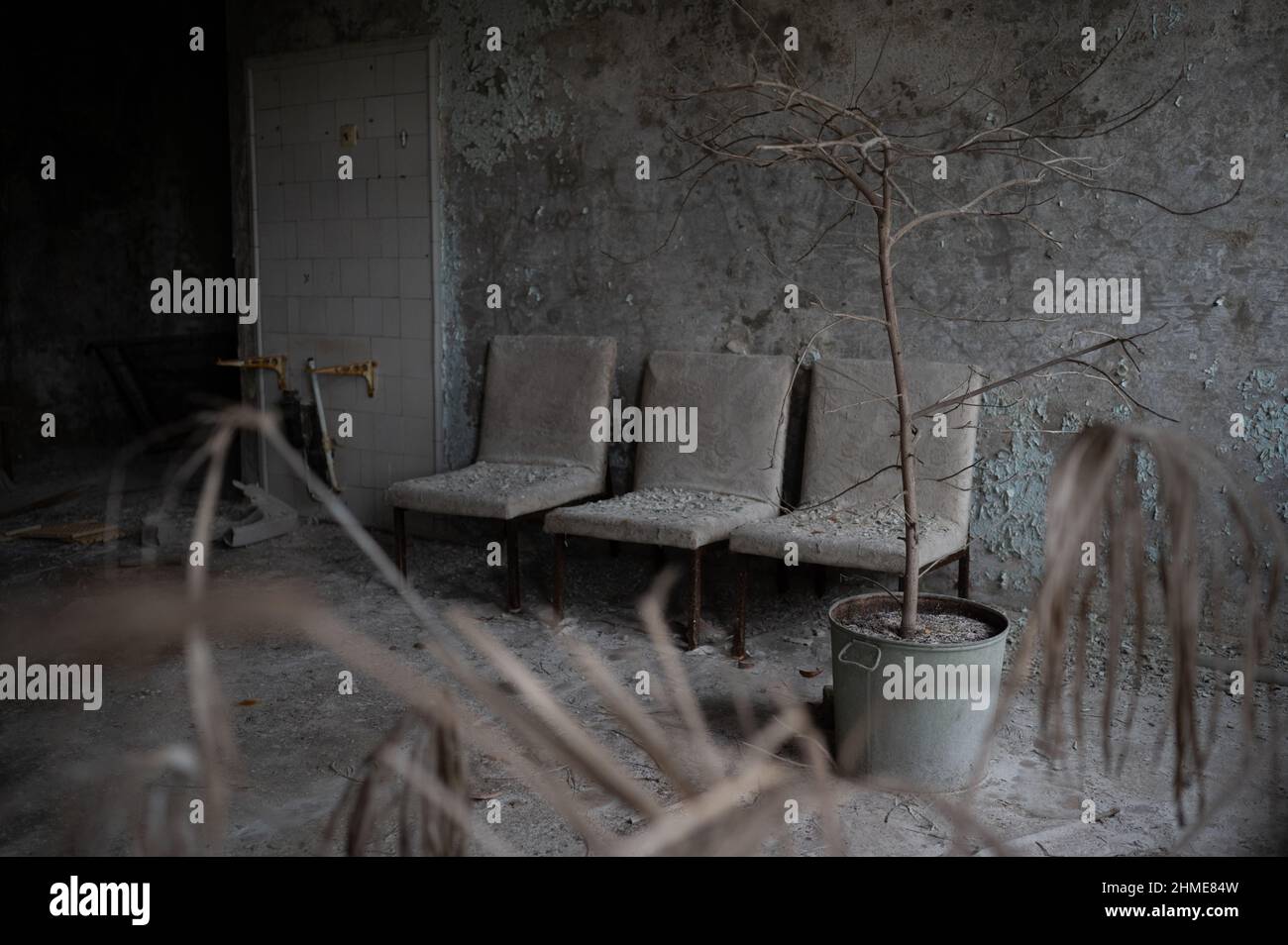 A decaying waiting room in the hospital in Pripyat, Ukraine near the Chernobyl Nuclear Power Plant. Stock Photo