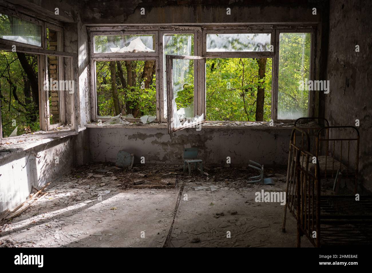 A decaying nursery in an abandoned hospital in Pripyat, Ukraine near the Chernobyl Nuclear Power Plant. Stock Photo