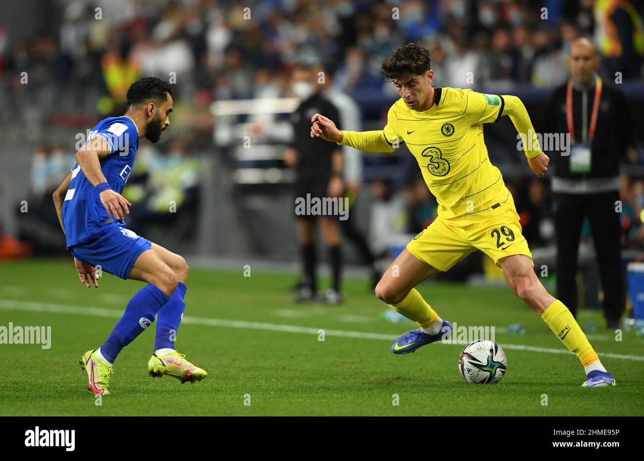 Al-Hilal's Mohammed Al-Breik (left) and Chelsea's Kai Havertz battle for the ball during the FIFA Club World Cup, Semi Final match at the Mohammed Bin Zayed Stadium in Abu Dhabi, United Arab Emirates. Picture date: Wednesday February 9, 2022. Stock Photo