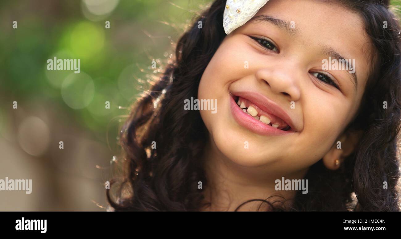 Cute mixed race child girl of hispanic and asian mix ethnicity posing ...