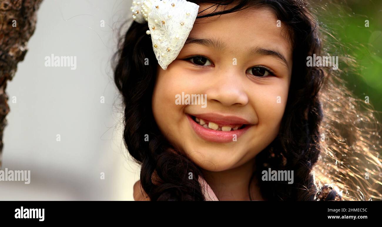 Cute mixed race child girl of hispanic and asian mix ethnicity posing ...