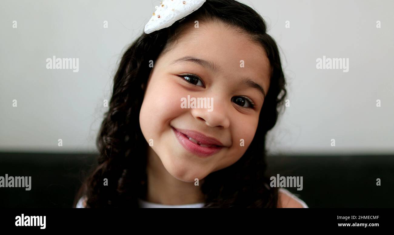Little girl child portrait smiling, hispanic asian mix race kid