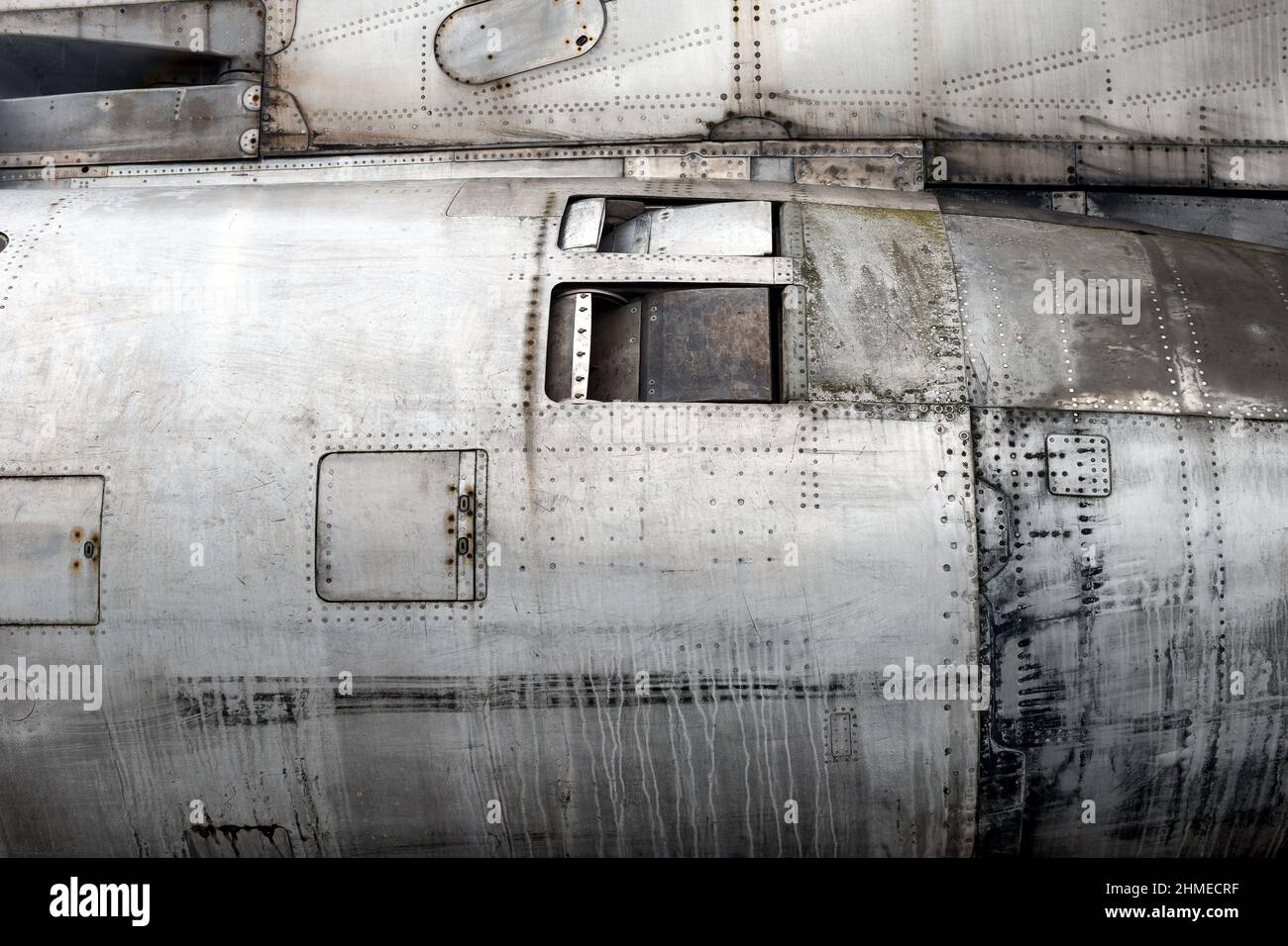 full framed side view of a old rusty metallic big jet plane turbine reactor Stock Photo