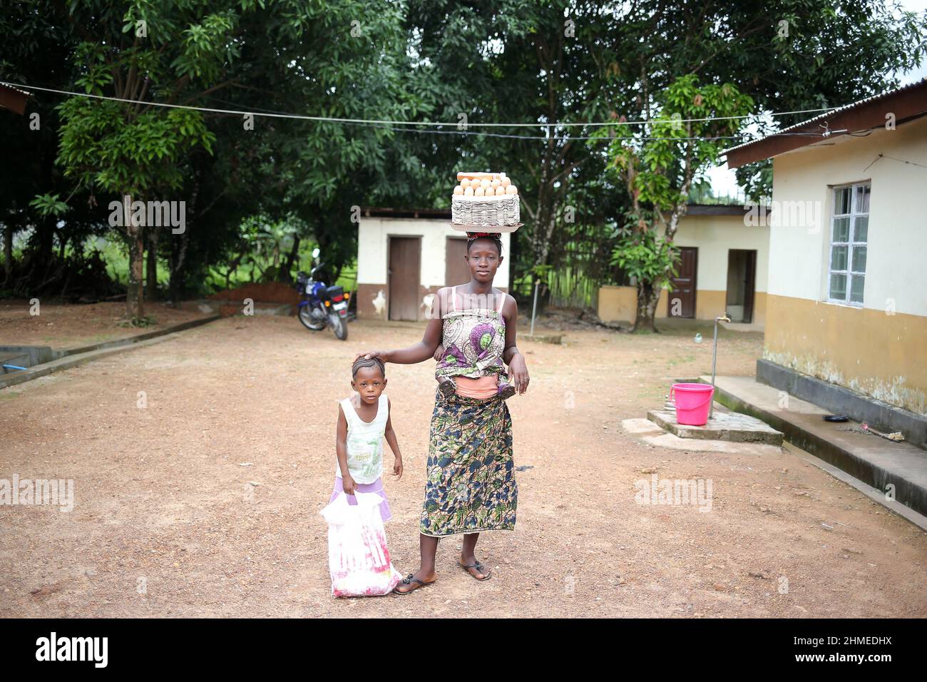 A mother and child at a healthcare and maternity hospital in Sierra Leone. Stock Photo