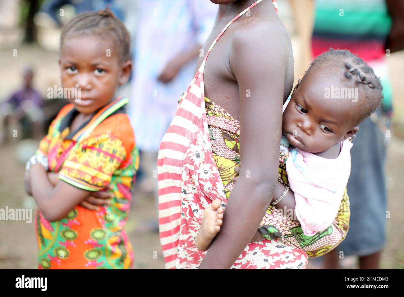 A mother and children at a healthcare and maternity hospital in Sierra Leone. Stock Photo