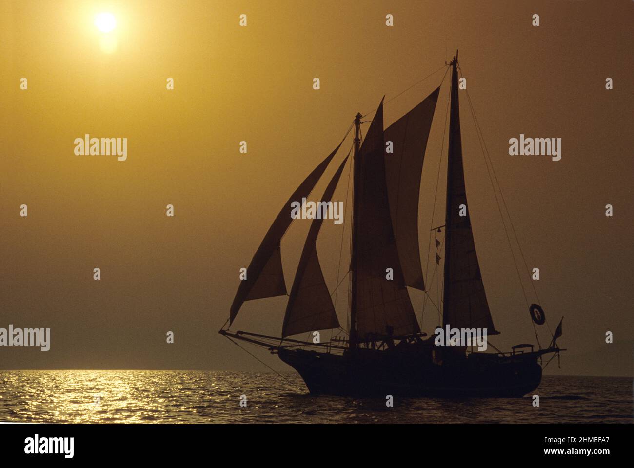Goelette sailing on mediterranean sea sunset Stock Photo