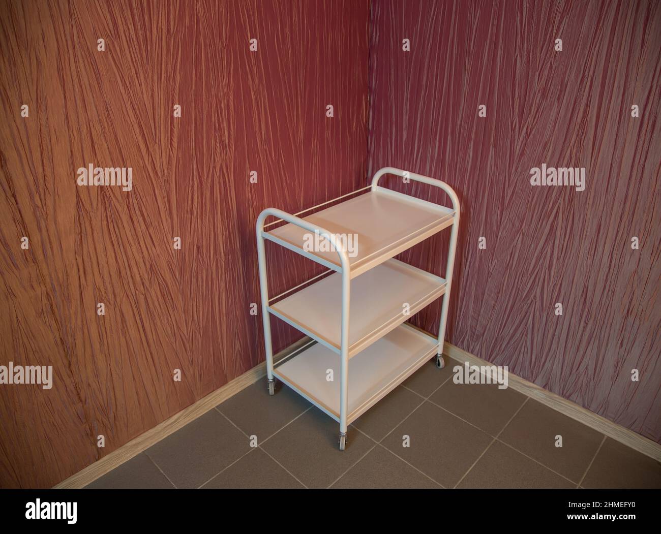 Medical devices utility cart standing in the corner Stock Photo Alamy