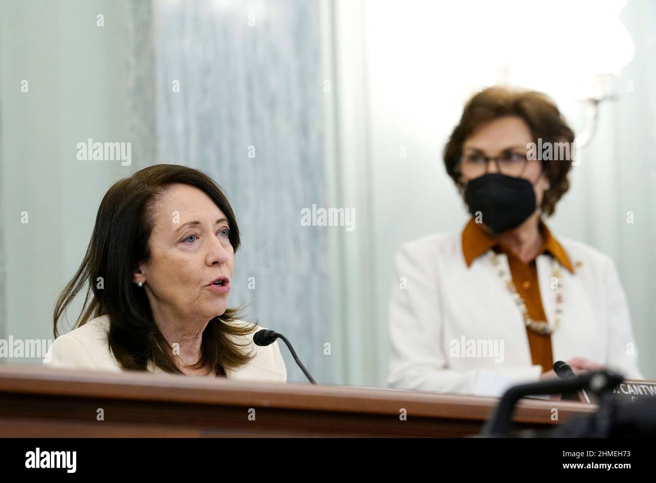 United States Senator Maria Cantwell (Democrat of Oregon), Chairman, US Senate Committee on Commerce, Science, & Transportation, left, speaks during the nomination hearing for Gigi Sohn, who is President Joe Bidens nominee to serve on the Federal Communications Commission, Wednesday, Feb. 9, 2022, on Capitol Hill in Washington. US Senator Jacky Rosen (Democrat of Nevada), listens at right. Credit: Susan Walsh/Pool via CNP Stock Photo