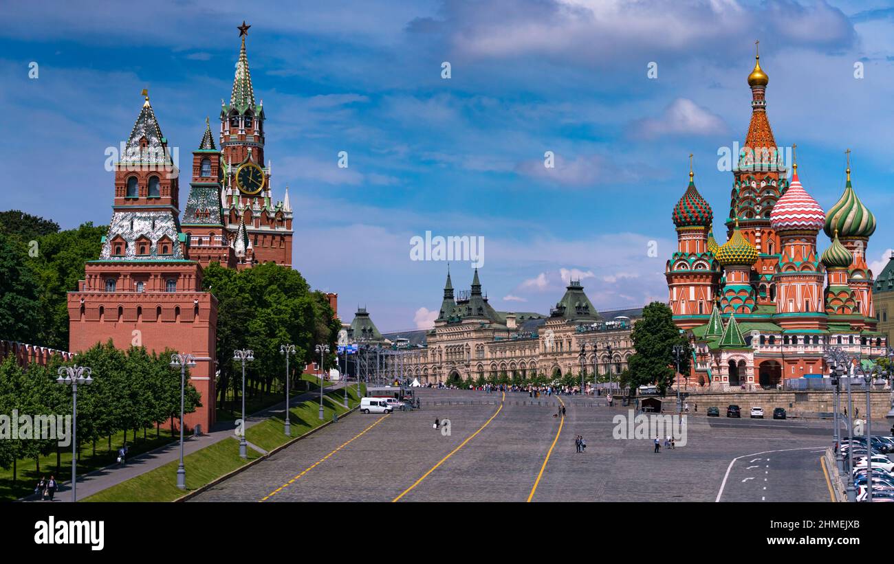 Moscow, Russia - June 8, 2021: Spasskaya tower of the Kremlin, St. Basil's Cathedral and Vasilyevsky Spusk square Stock Photo