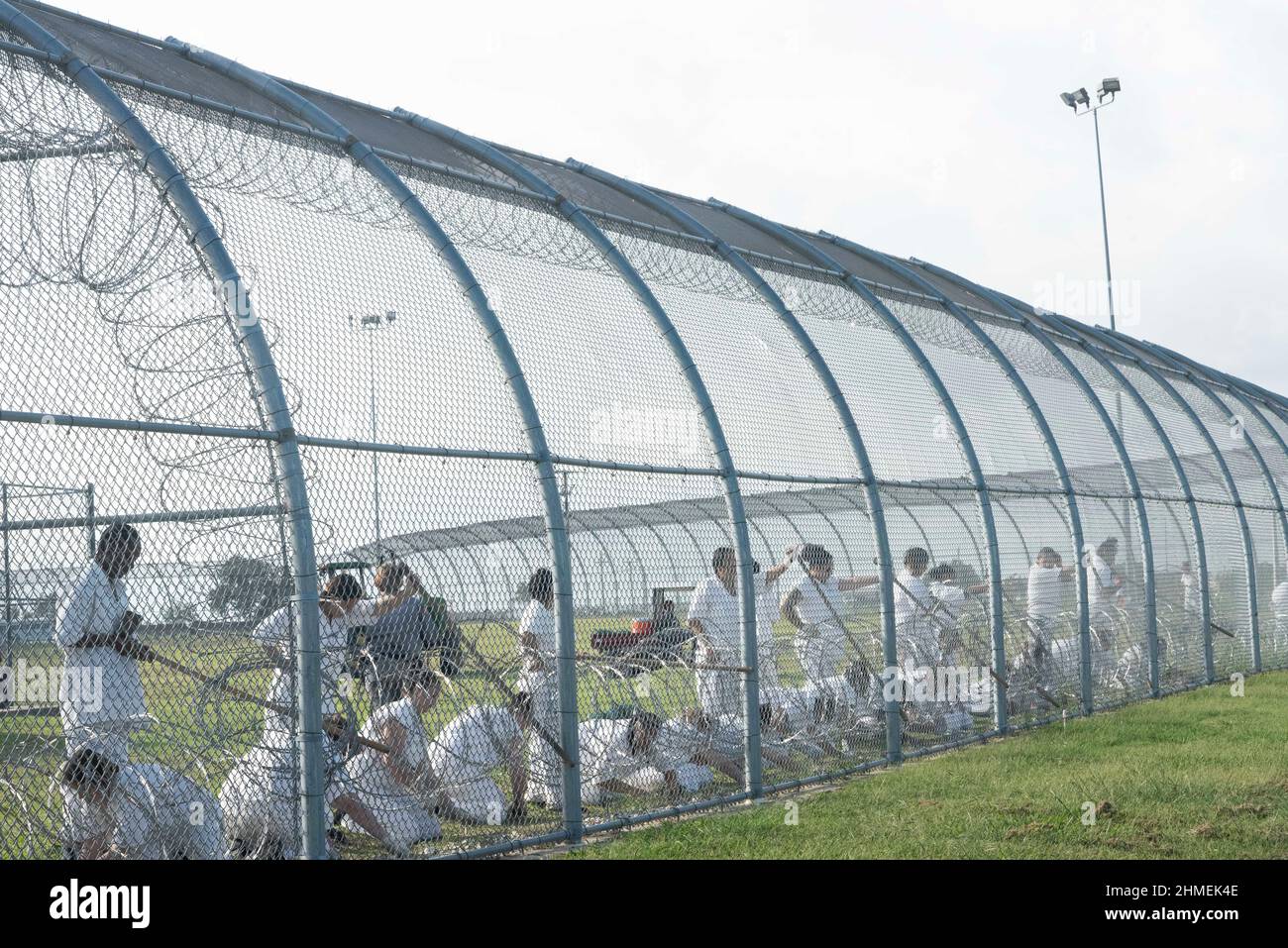 Gatesville Texas USA October 19, 2016: A women's work detail mends the fence line in the Murray Unit of the Texas Department of Corrections (TDCJ). The all-women's prison houses hundreds of offenders from throughout Texas. ©Bob Daemmrich Stock Photo
