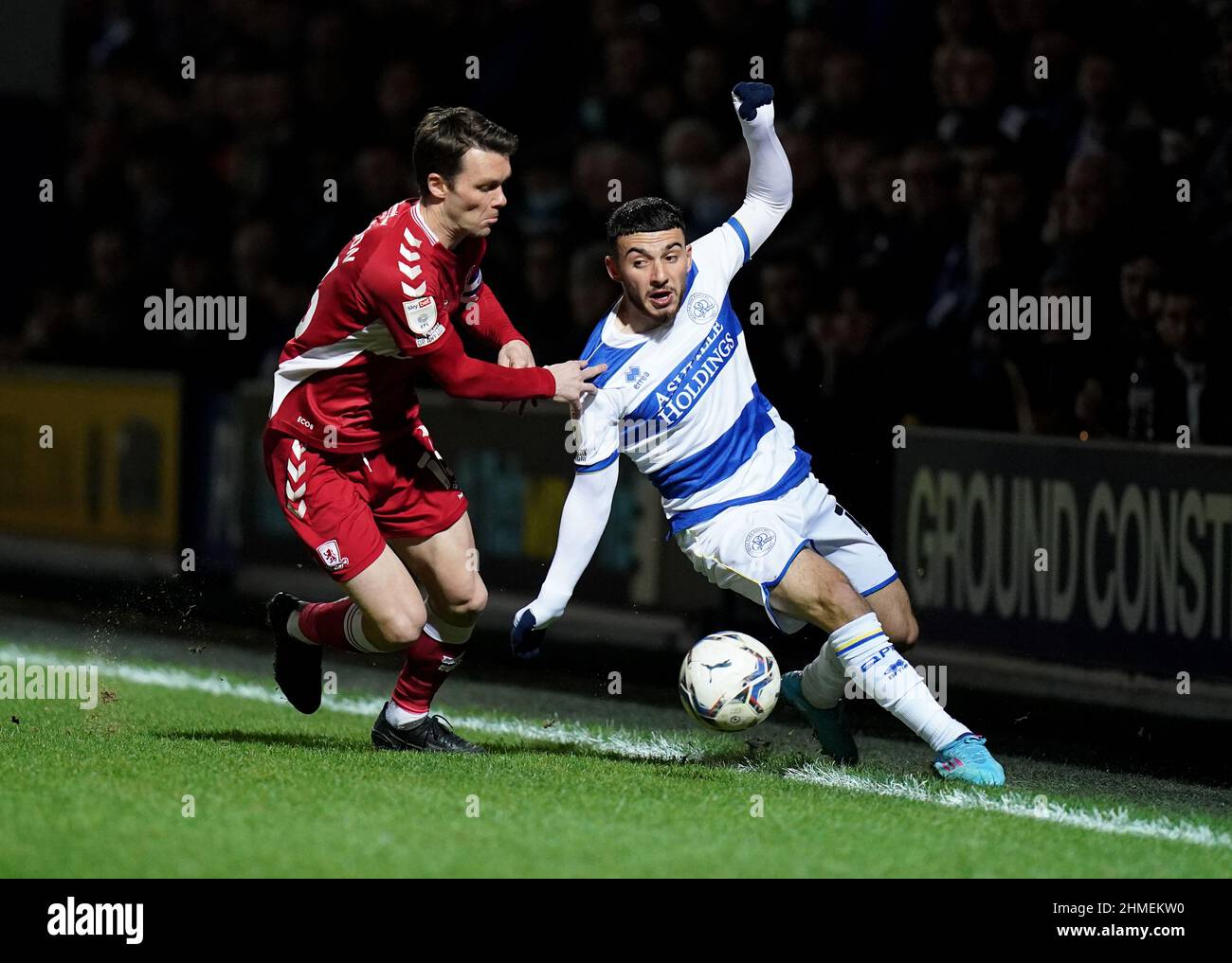 Middlesbrough's Jonny Howson (left) and Queens Park Rangers' Ilias Chair battle for the ball during the Sky Bet Championship match at the Kiyan Prince Foundation Stadium, London. Picture date: Wednesday February 9, 2022. Stock Photo