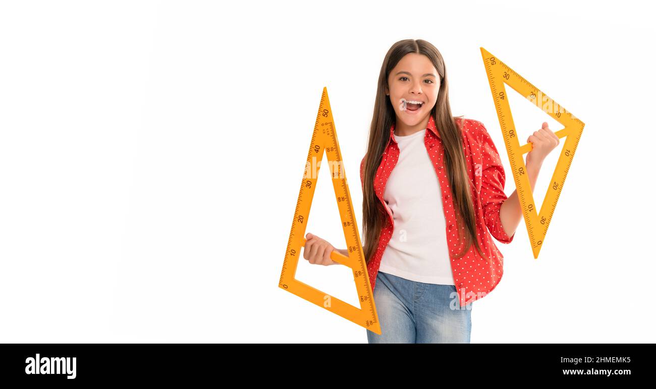 happy funny teen girl hold triangle measuring angle degree at school isolated on white, education. Stock Photo