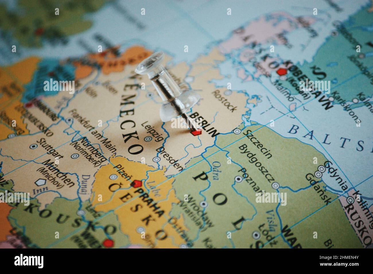 Closeup shot of a world map with pin on a Berlin Stock Photo - Alamy