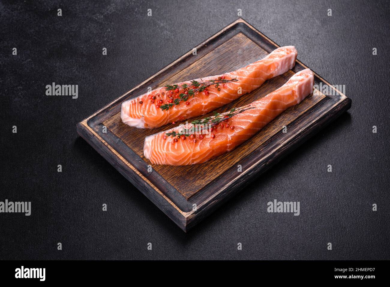 Salmon. Fresh raw salmon fish fillet with cooking ingredients and herbs