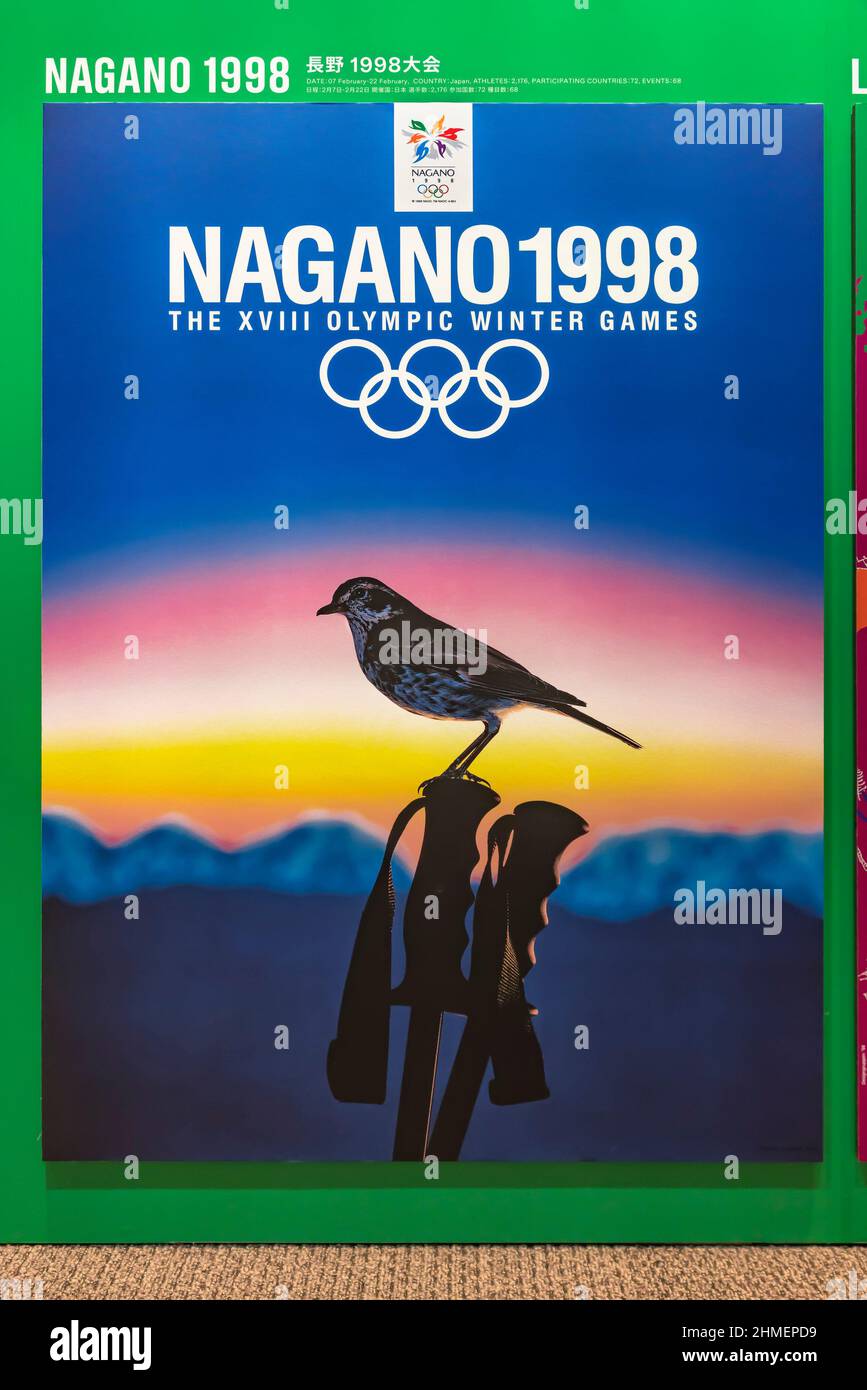tokyo, japan - august 10 2021: Japanese poster of Nagano 1998 winter olympics games depicting a thrush perched on a ski pole with mountains Stock Photo