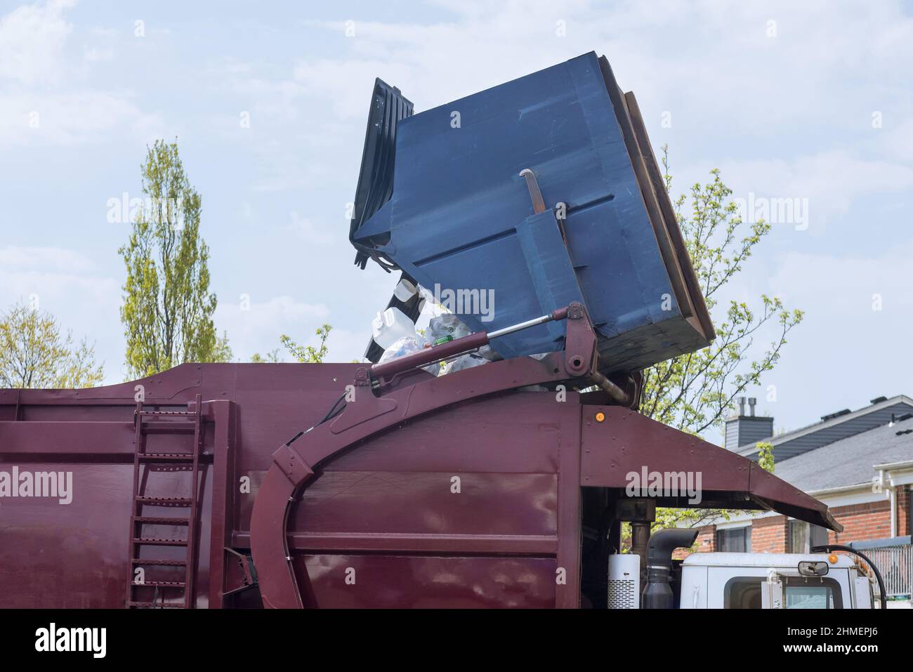 Municipal waste disposal with a special car garbage truck, the garbage