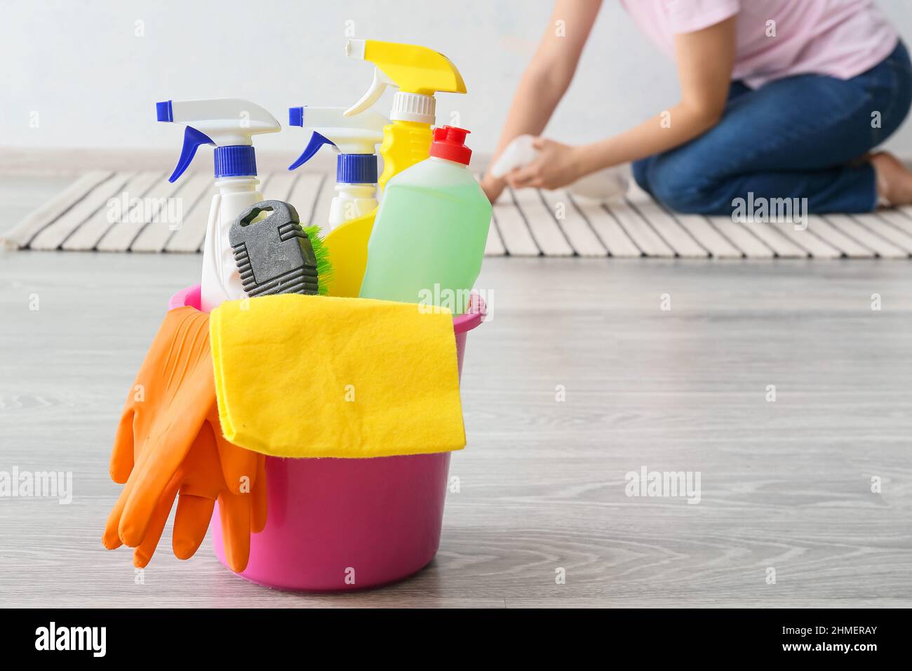 Bucket with cleaning supplies on white wooden surface at car wash Stock  Photo - Alamy