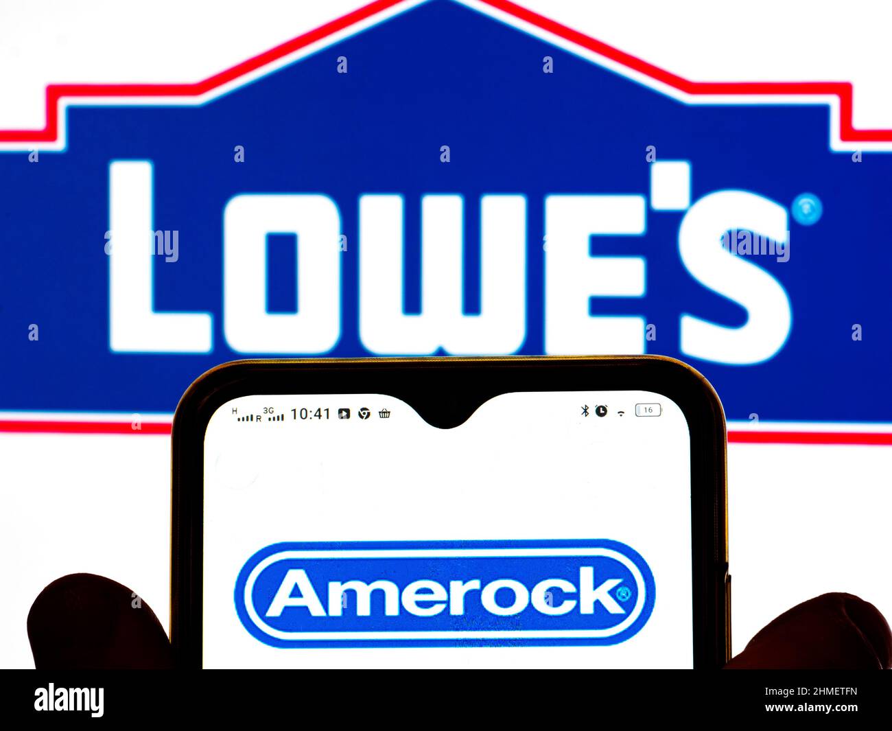 Ukraine. 09th Feb, 2022. In this photo illustration, the Amerock logo is displayed on a smartphone screen and a Lowe's Companies, Inc. logo in the background. (Photo by Igor Golovniov/SOPA Images/Sipa USA) Credit: Sipa USA/Alamy Live News Stock Photo