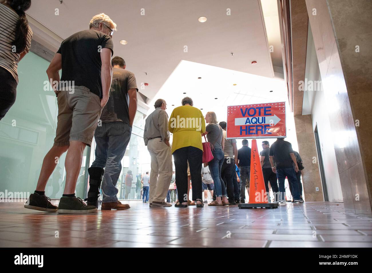 Austin, Texas USA  October 24, 2016: Texas voters stand in long lines at a polling place in the former Highland Mall during early voting for the presidential election of 2016.  ©Bob Daemmrich Stock Photo