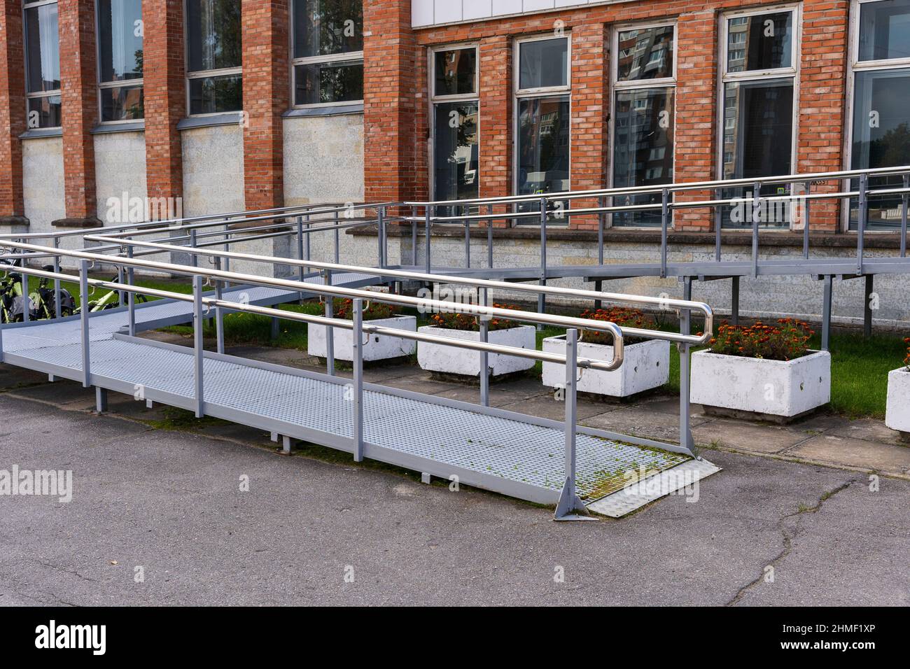 Metal ramp at the entrance to a public building for the disabled Stock ...