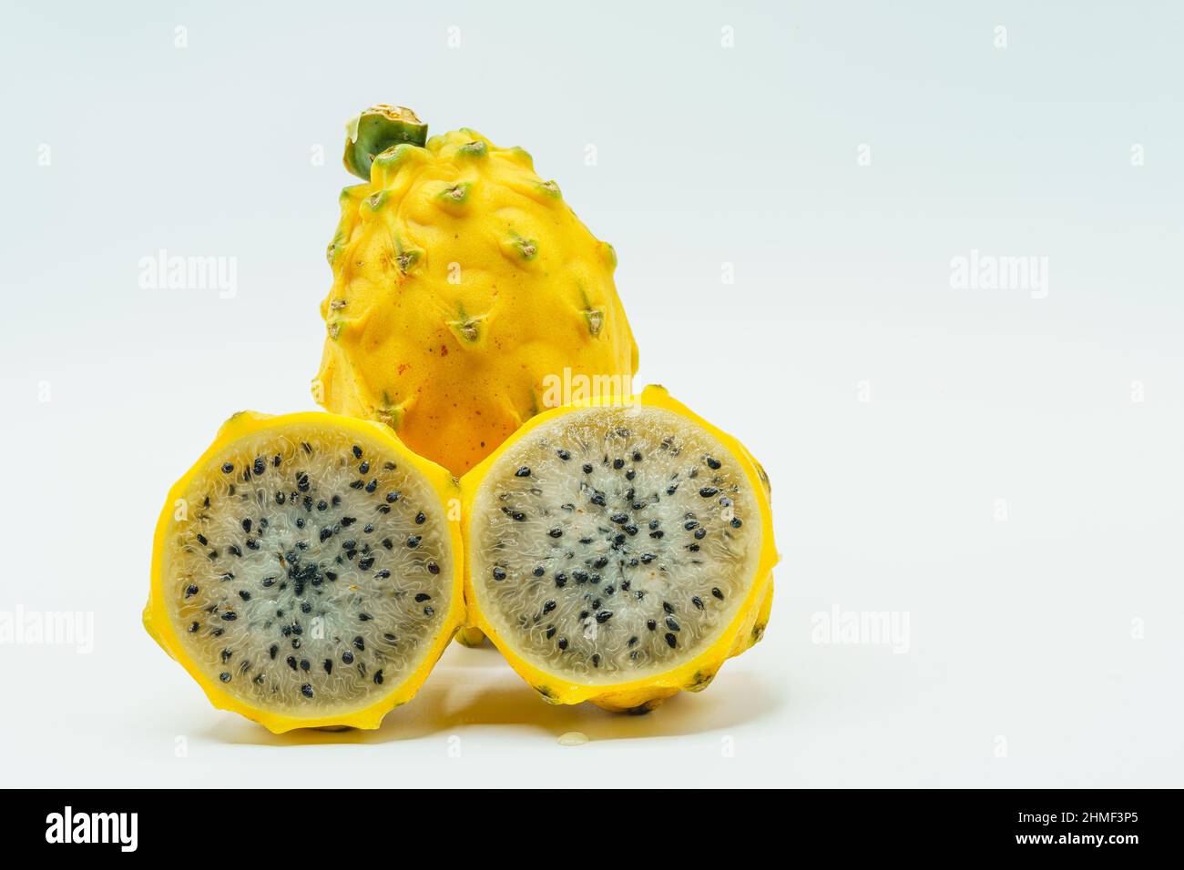 Yellow pitahaya or dragon fruit on white background. Stock Photo