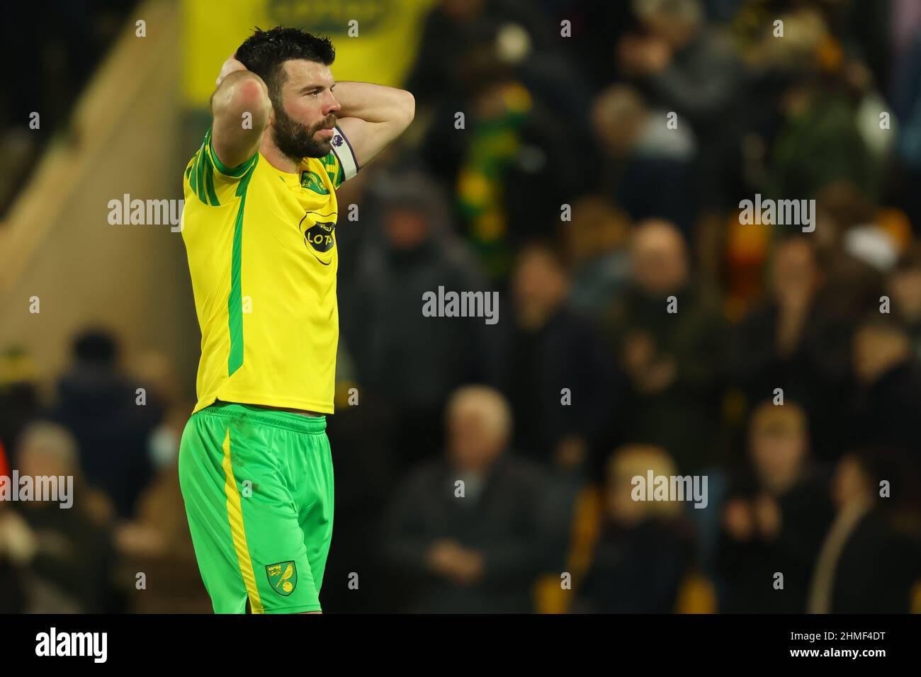 Norwich, UK. 9th February 2022 ;  Carrow Road, Norwich, Norforlk, England; Premier League football, Norwich versus Crystal Palace; Grant Hanley of Norwich City holds his head after the 1-1 draw Credit: Action Plus Sports Images/Alamy Live News Stock Photo