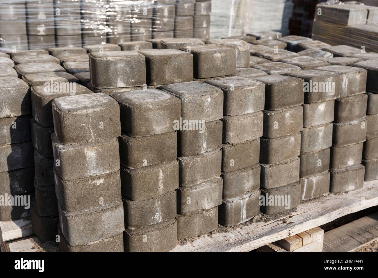 Rows of paving slabs on a pallet, Paving stones are prepared for paving ...