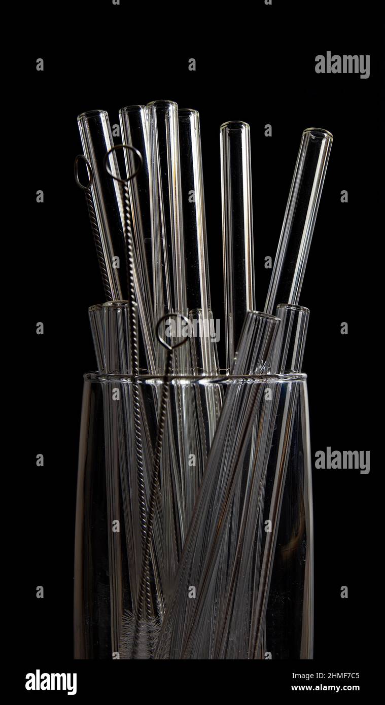Glass with glass straws and cleaning brush Stock Photo Alamy