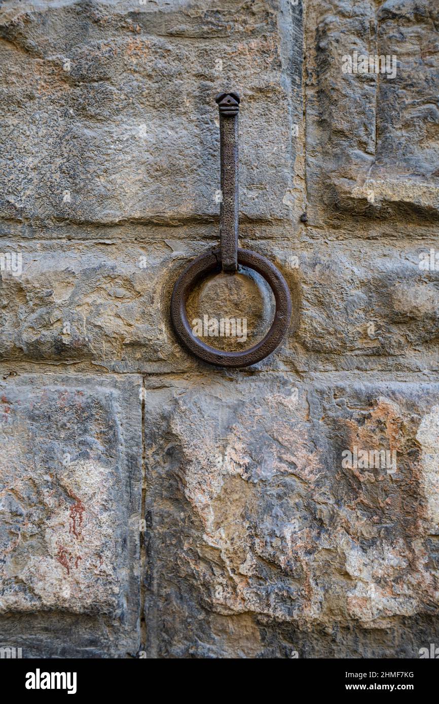 Florence, Italy. January 2022.  the iron rings to tie the horses on the walls of the medieval buildings in the city center Stock Photo