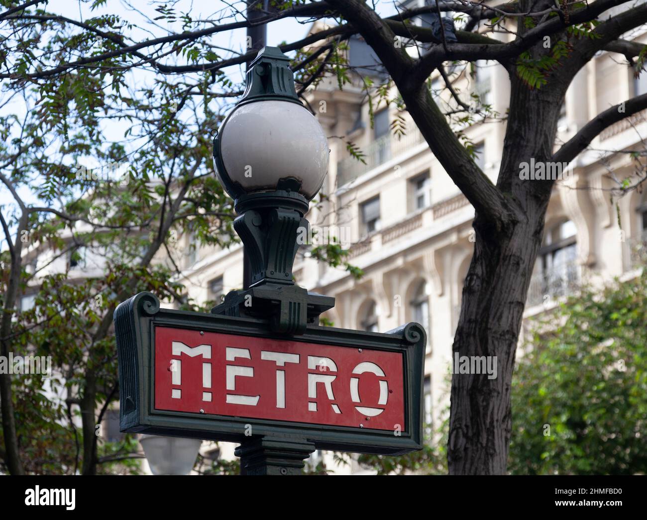 Jaurès Dervaux lamp post  style Metro sign outside the Richelieu Drouot Metro station entrance in central Paris, France. 1930s style Stock Photo